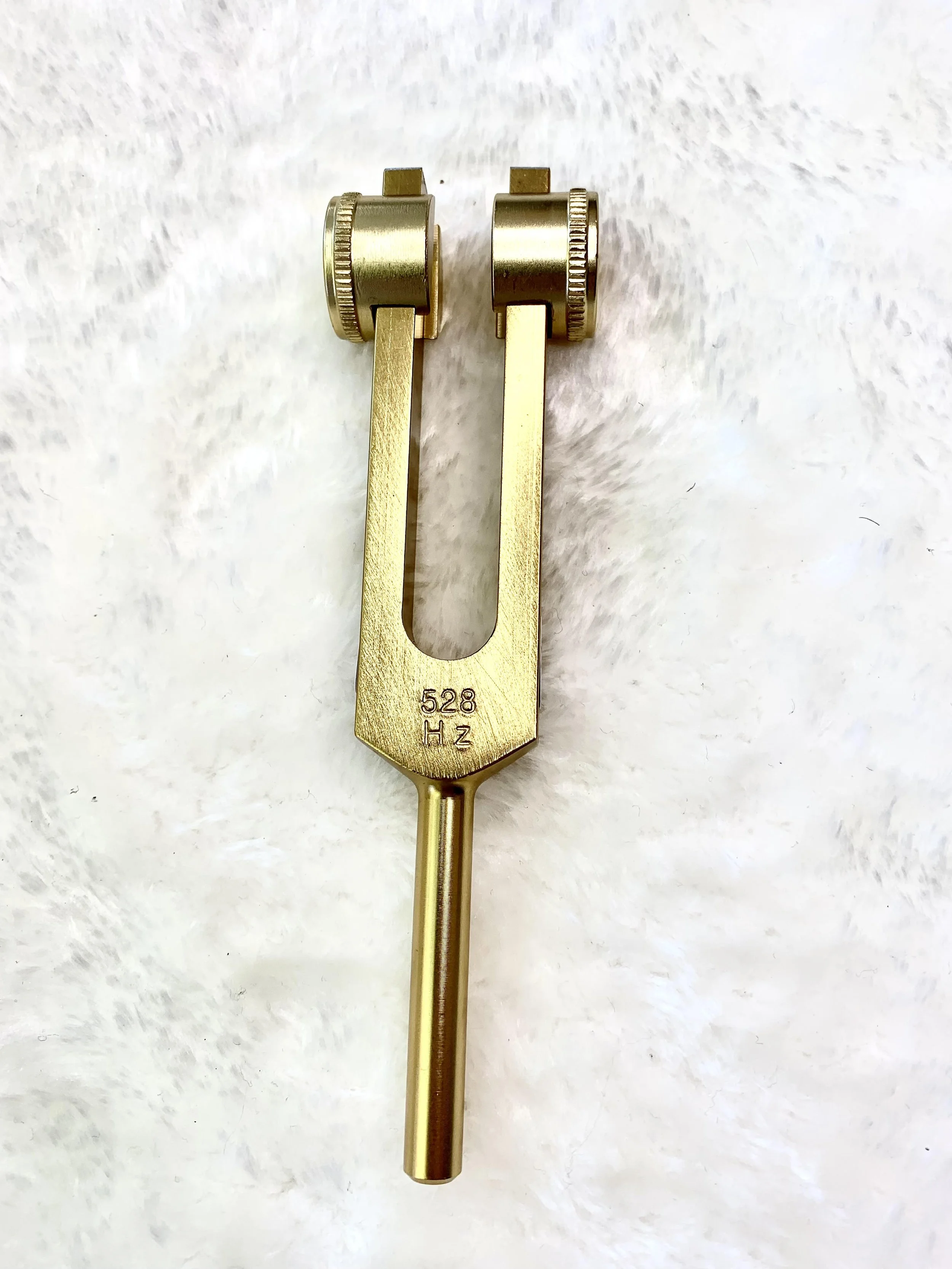 528 hz weighted tuning fork — Evergreen Beauty and Wellness